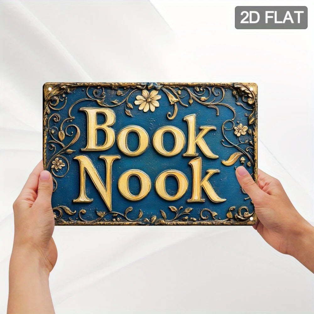 Vintage "Book Nook" Metal Wall Sign , Ornate Golden Lettering on Dark Background with Floral Patterns, Perfect for Room Decor